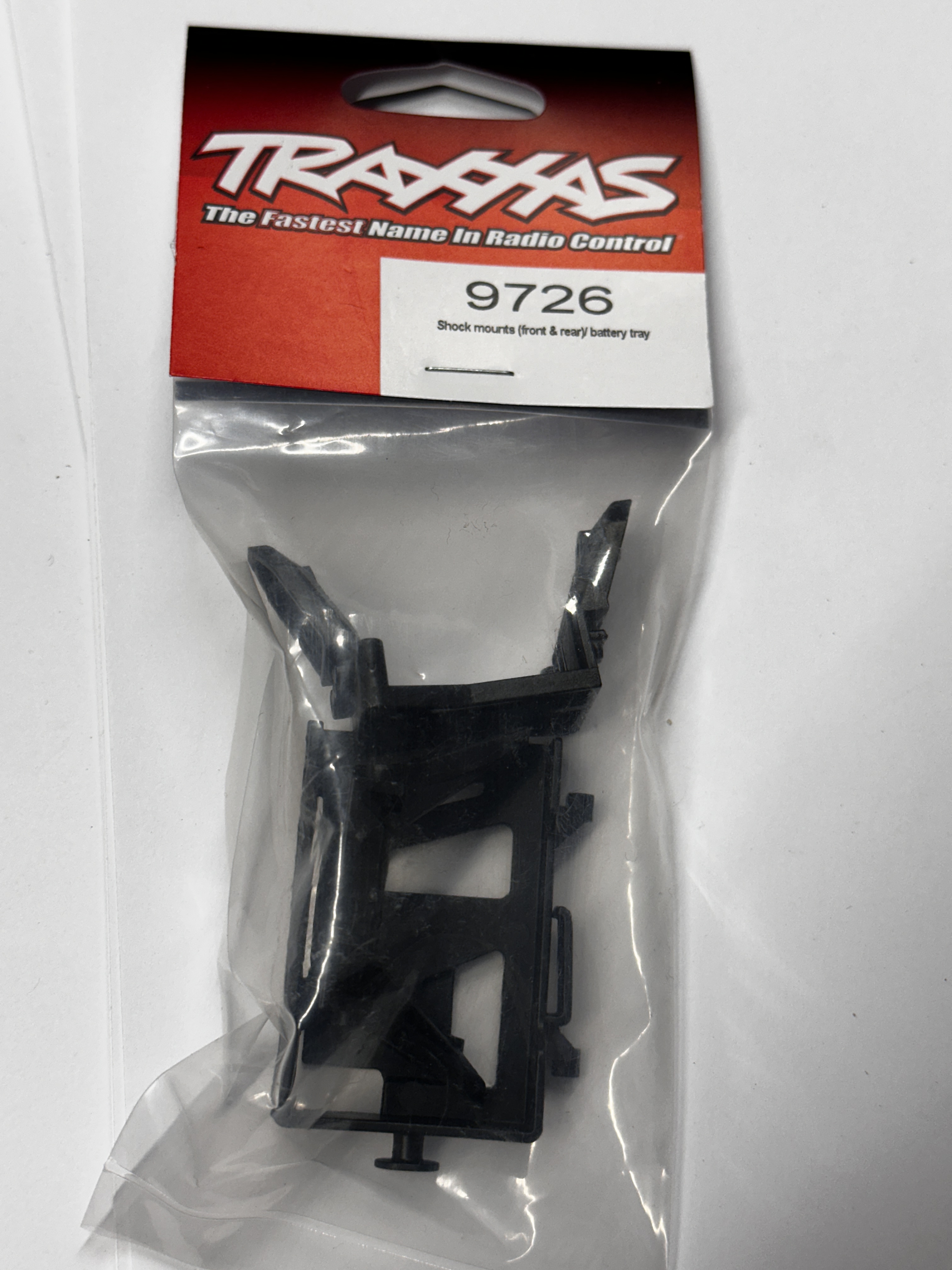 Traxxas držák tlumičů (pár), krabička baterie