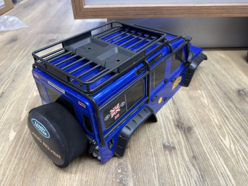 ZÁNOVNÍ - Traxxas kompletní karosérie Land Rover Defender modrá: TRX-4 v tuningu