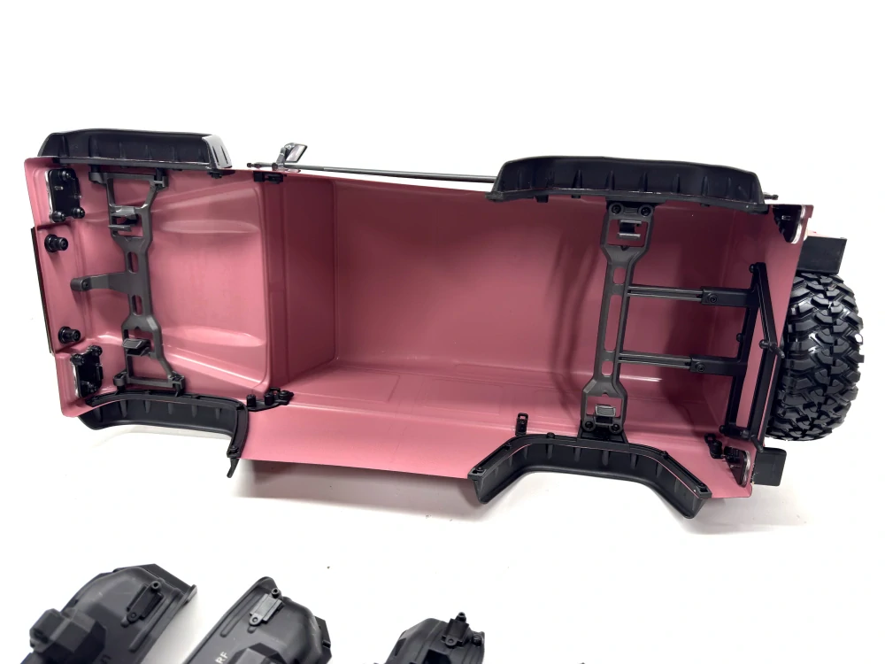 Traxxas bezsponková kompletní karosérie Land Rover Defender červená: TRX-4 + sada na přestavbu