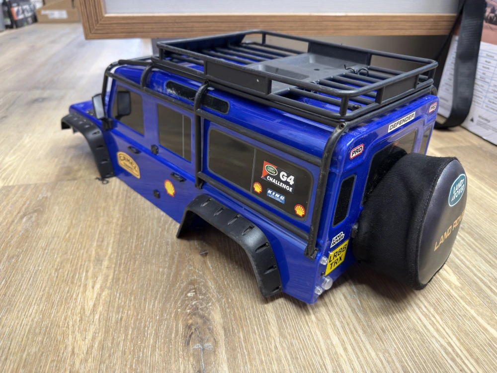 ZÁNOVNÍ - Traxxas kompletní karosérie Land Rover Defender modrá: TRX-4 v tuningu